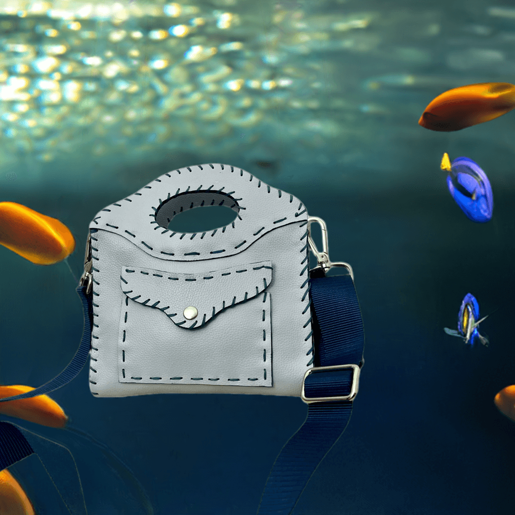 Tracolla Lilly in pelle. Handcrafted bag with shaped handle.